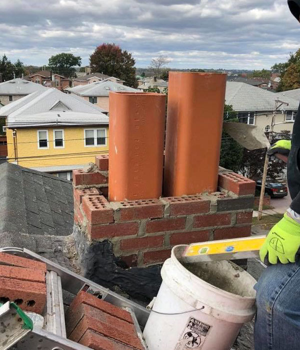 chimney repairs & rebuild services newton west roxbury jamaica plain watertown cambridge somerville belmont south boston riverside masonry & construction